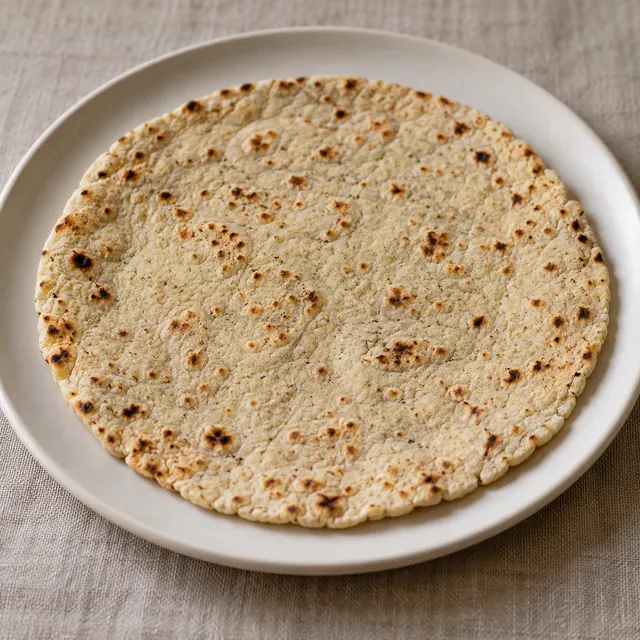 Pale sorghum jowar roti with light toasted spots